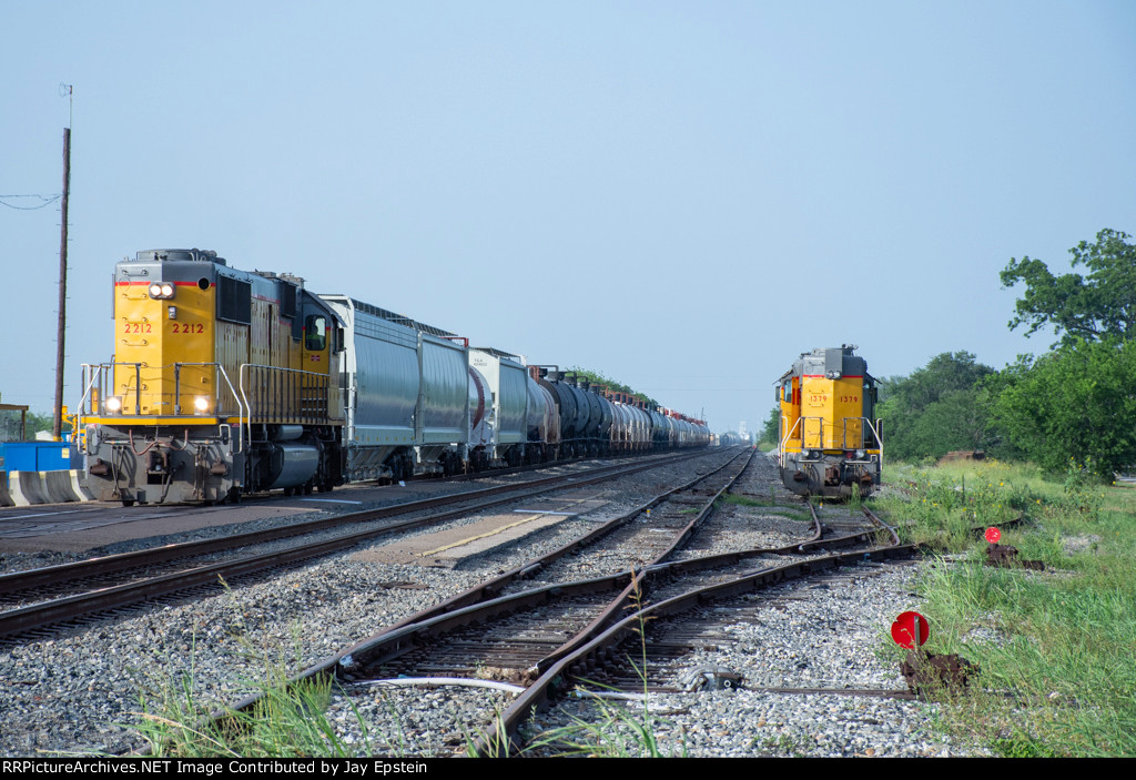 UP 2212 passes 1379 in the Bloomington Yard 